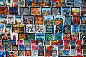 Tingatinga paintings…not sure if they're his or his students. :)