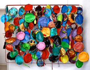 Art In The Making, Rhea Carmi, art making materials and paint hanging from box spring frame