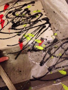 Pressing a screen onto the canvas...